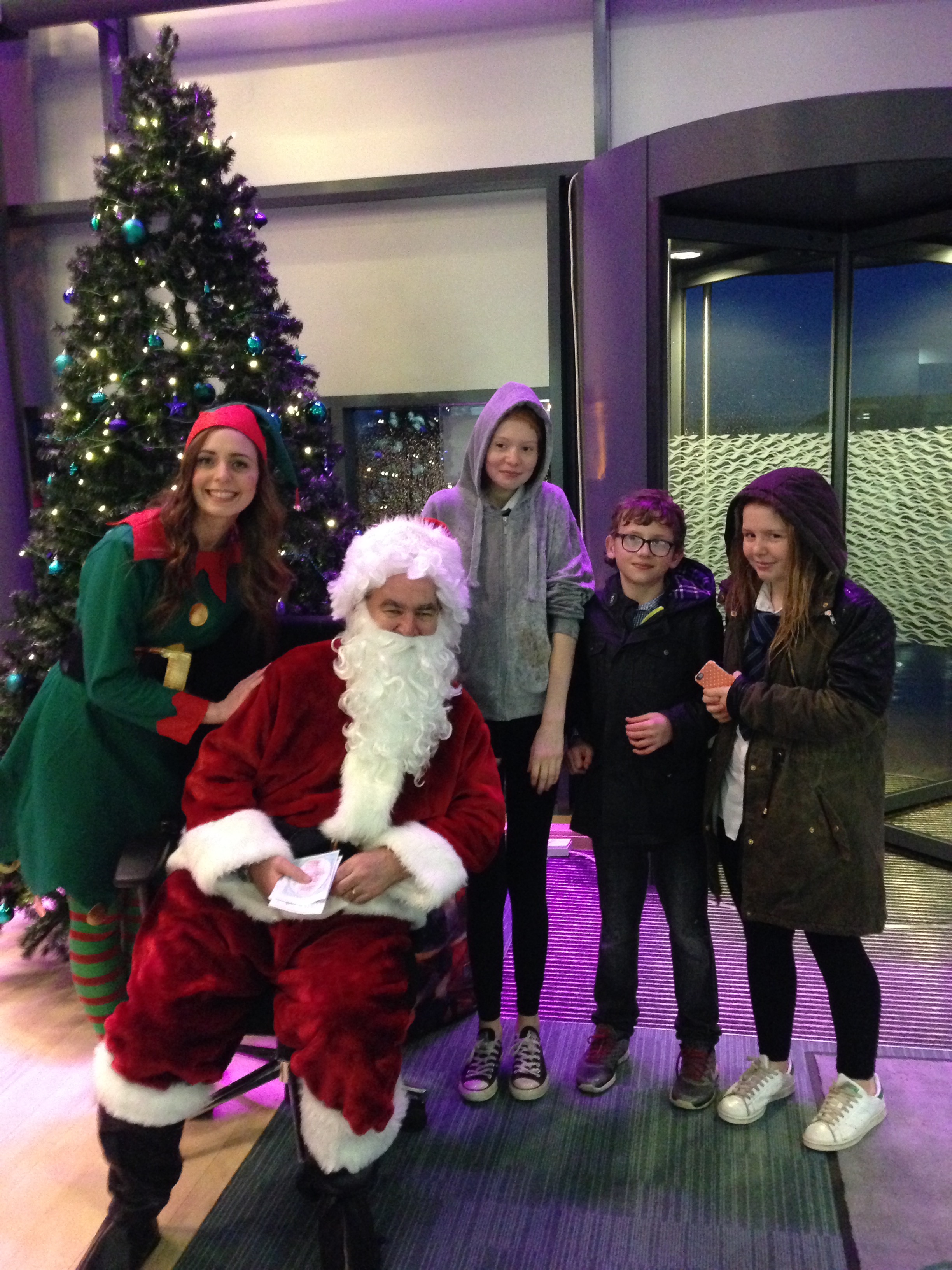 Santa his elf and the children